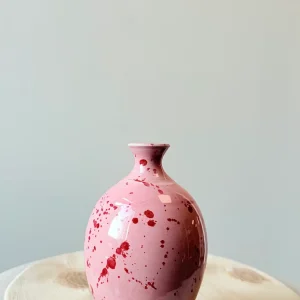 Rosa liten med rött